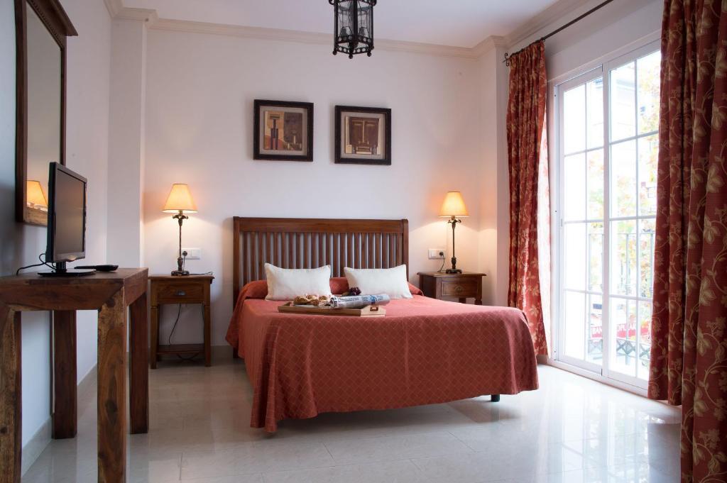 Apartamentos Plaza Cavana 5 Nerja Oda fotoğraf